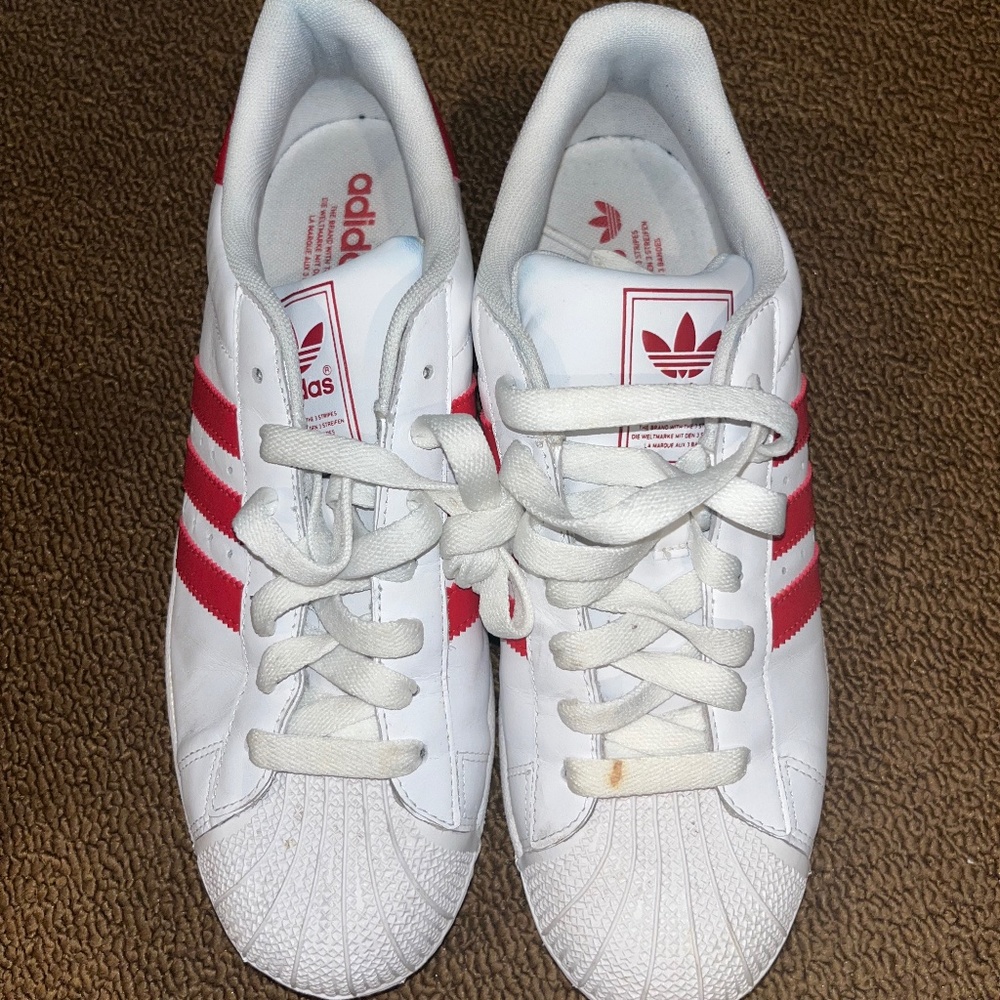 Red and white striped adidas